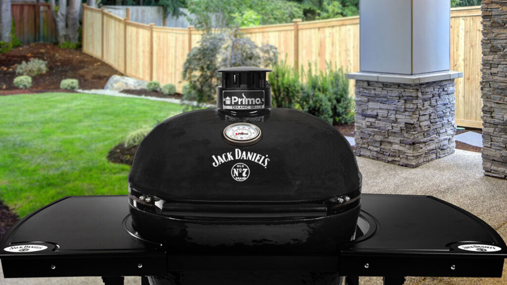 Primo grills XL charcoal jack daniels grill outside on patio